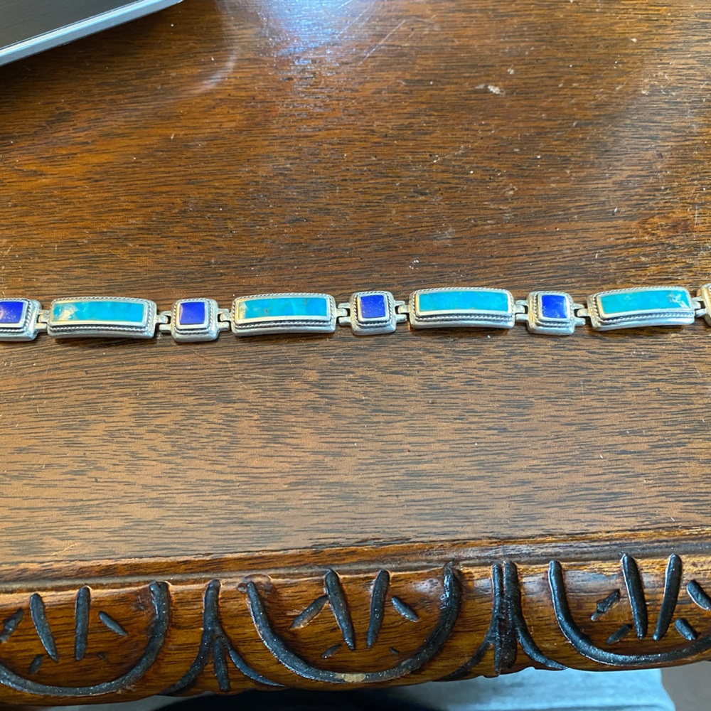 Sterling silver & turquoise bracelet size 7 inches long signed .Mint Condition